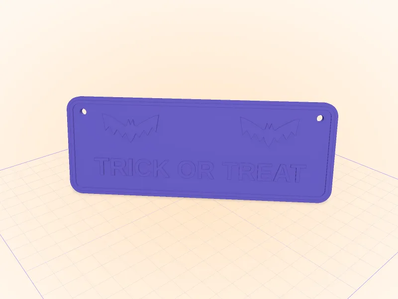A 3D-printable door sign with TRICK OR TREAT in raised letters, two bats and two ribbon holes